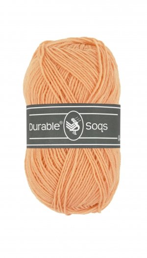 A 50g ball of Durable Soqs yarn, showing the fine, multi-ply wool and polyamide blend designed for long-lasting, durable socks in peach