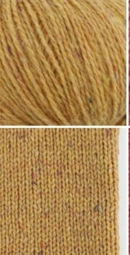 A 50g ball of Etrofil Rainbow Organic Merino yarn, showcasing its plush, rounded twist. The image highlights the rich texture of the 75% organic merino wool and 25% polyamide blend, ideal for creating cozy, high-quality winter accessories like beanies, scarves, and cardigans in orange