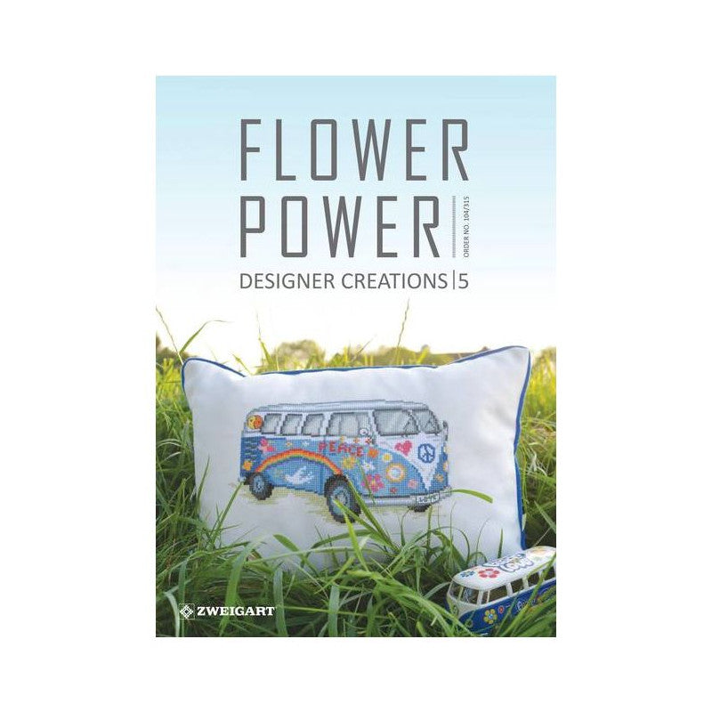 The cover of the 'Flower Power' needlework magazine, featuring lush floral designs. The book includes a curated collection of cross-stitch and embroidery patterns focused on roses, lilacs, and violets, along with two exclusive punch needle projects. The aesthetic is bright, botanical, and perfect for spring and summer craft inspiration.