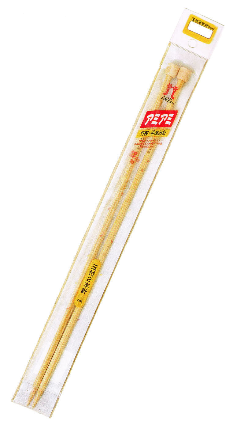 A pair of Hamanaka bamboo knitting needles, 12mm in diameter, packaged in a clear plastic tube with a yellow label.
