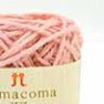 A compact ball of premium Japanese COMA COMA jute yarn, highlighting the consistent thickness and rich color saturation of the natural fibers in light pink