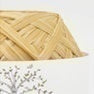 A vibrant selection of Hamanaka Eco Andaria yarn cakes in various summer colors, made in Japan in light brown camel colour
