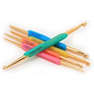 A set of double pointed crochet hooks in various sizes with colorful handles.