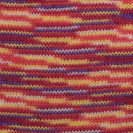 A 25-gram ball of Hamanaka KORPOKKUR multi-colored yarn, made in Japan. The yarn features a beautiful variegated dye pattern with soft transitions between vibrant hues.