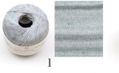 Several skeins of Hamanaka Undine yarn in various colors, each labeled with the brand and product name. Close-up of Hamanaka Undine ribbon yarn, highlighting the smooth, woven tape construction that prevents splitting during knitting