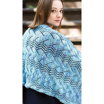 Inside look at a shawl chart in Book 13, showing the professional layout and high-definition photography of the finished wrap."