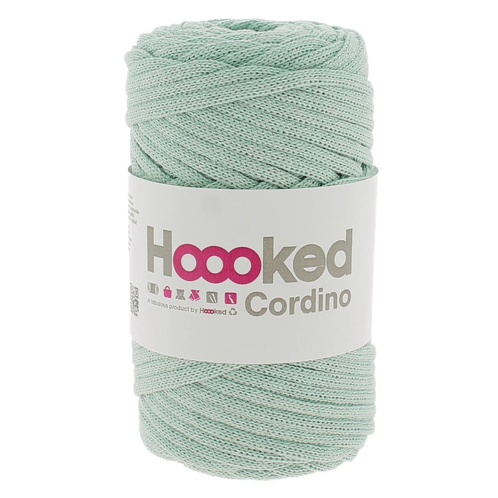 A spool of Hoooked Cordino highlighting the dense, non-stretch braided strand and the natural, matte appearance of its recycled textile fibers in Early Dew Light Green Colour