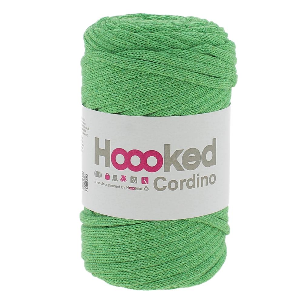 A spool of Hoooked Cordino highlighting the dense, non-stretch braided strand and the natural, matte appearance of its recycled textile fibers in salad green colour