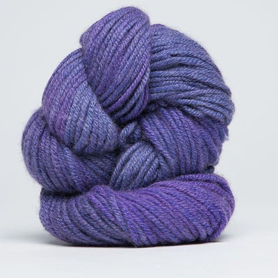 A delicate skein of hand-dyed Jade Sapphire yarn, showcasing a sophisticated blend of 55% silk and 45% cashmere in Hydranea colours