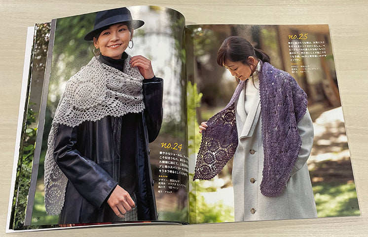 Internal page showing 29 various crochet projects including shawls, vests, and cozy winter accessories