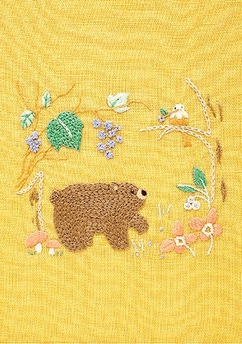 DMC Chicchi-san embroidery kit featuring a delicate Summer bear design pre-printed on a 100% yellow linen background