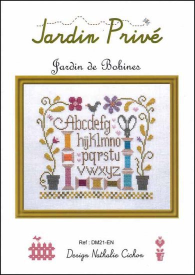 A professional cross-stitch chart by French designer Jardin Privé, titled 'Jardin de Bobines.' The design features a high-definition arrangement of vintage-style thread spools transformed into flowers, accompanied by elegant folk-art borders and French-chic typography