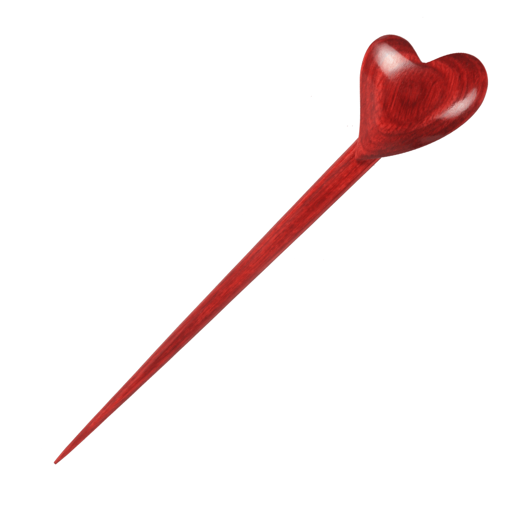 A red heart-shaped shawl stick made of laminated beechwood, designed to secure knitted shawls or scarves.