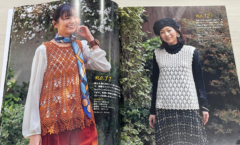 A model wearing a versatile 2-way crochet poncho in a rich, autumnal wool blend