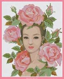 A cross stitch kit image featuring a woman with rose flowers in her hair, indicative of the product's floral theme.