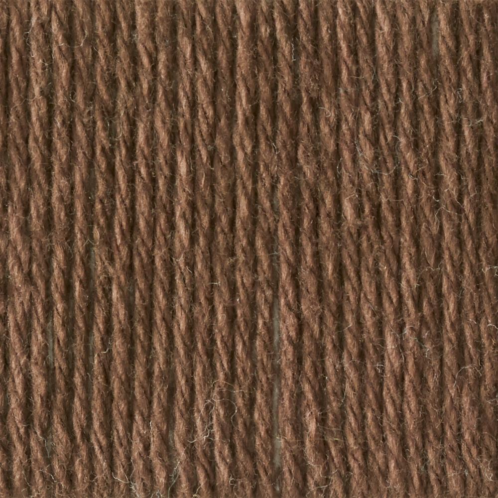 A skein of Lily Sugar N' Cream 100% cotton yarn in warm brown color. The texture is soft yet sturdy, showing the natural matte finish of the cotton fibers. The packaging clearly displays the Lily brand logo and weight options, ideal for durable kitchen and bathroom DIY projects.