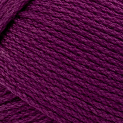Close-up of 24/7 Cotton yarn by Lion Brand, showing the smooth, cord-like structure that provides excellent stitch definition for crochet and knitting in Beets colour
