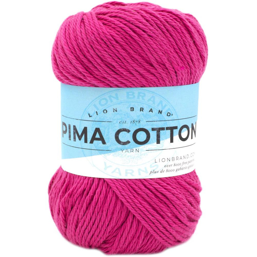 A 100g skein of Lion Brand Pima Cotton yarn showcasing its smooth, matte finish and multi-ply construction. The image highlights the high-quality combed cotton fibers, perfect for creating durable baby blankets, summery garments, and home decor items in a wide range of vibrant and muted colors in Cabaret Pink colour. 