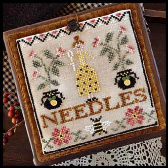 A professional cross-stitch chart titled 'Needle Lady Pocket' by Little House Needleworks. The design features a primitive, folk-art style lady holding a needle and thread, surrounded by delicate borders and traditional motifs. The chart includes a suggested DMC thread palette and instructions for the design, which is intended to be sewn into a folding needle book or pocket.