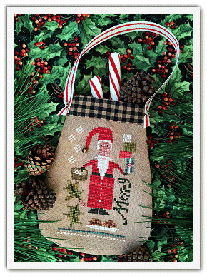 The Lizzie*Kate 'Very Merry Santa' cross-stitch kit featuring a whimsical Santa Claus design with festive lettering and rustic accents."