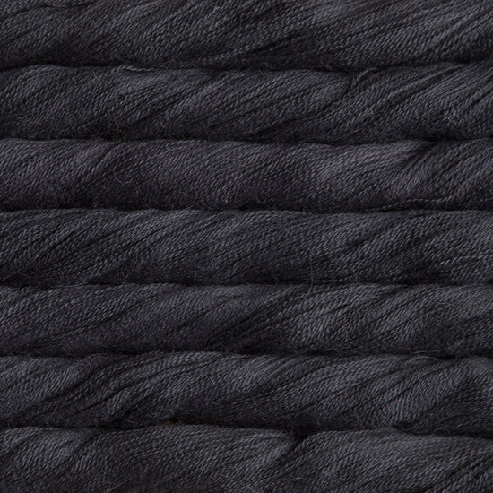 Hand-Dyed Lace Weight Yarn, Luxury Silk Knitting Fiber, Malabrigo Singapore.
A 50g skein of Malabrigo Silpaca yarn, showcasing its signature hand-dyed variegation and the luminous sheen of the silk-alpaca blend in Black colour