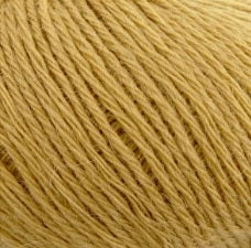 Close-up of Pierrot Chiffon yarn strands, highlighting the fine, fuzzy texture and the high-quality Japanese spinning  in mustard colour