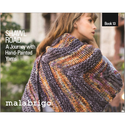 A cover image of Malabrigo Book 13 featuring a woman wearing a multicolored knitted shawl.