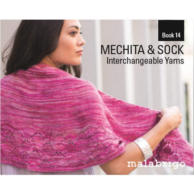 A cover image of Malabrigo Book 14 featuring a woman wearing a pink knitted shawl with a geometric pattern, showcasing the 'Mechita & Sock' interchangeable yarns.