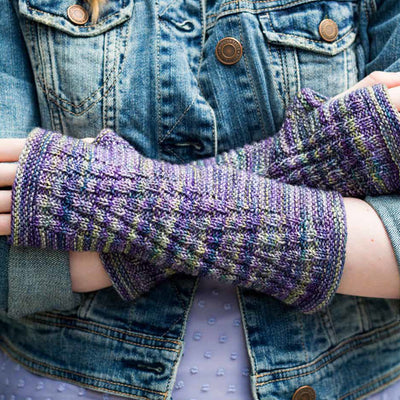 Close-up of a knitted accessory from Book 14, highlighting the incredible stitch definition of Malabrigo Sock yarn