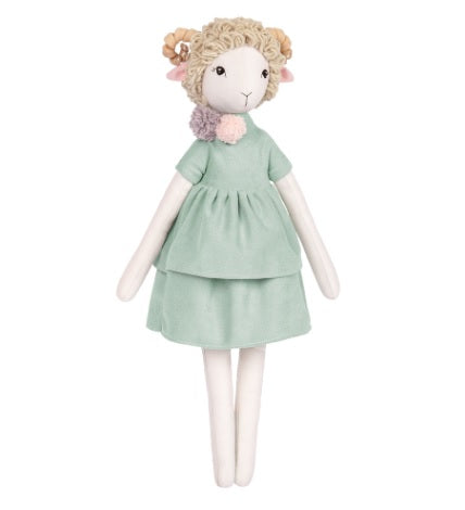 A premium doll-sewing kit by Miadolla featuring 'Miley the Lamb.' The kit includes high-quality linen and fabrics for the body and her baker-style outfit, mouline cotton threads for facial details, a sewing needle, and polyester stuffing. The finished lamb stands 43cm tall and features a gentle, artistic design inspired by a love for baking and desserts