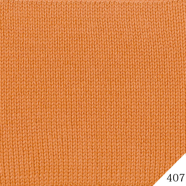Close-up of the Tree House Palace fibers, highlighting the clean plies and the smooth finish of the Uruguay merino blend in orange colour