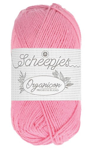 A person holding a ball of light pink yarn with 'Organicon' branding.
Hypoallergenic crochet cotton, eco-friendly knitting supplies, organic cotton for amigurumi, softest cotton for newborns, sustainable fiber arts