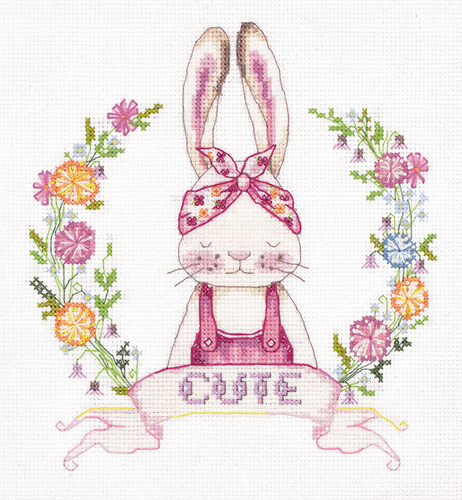 A sweet and beginner-friendly cross-stitch kit by Panna featuring a 'Cute Rabbit.' The design shows a soft, whimsical bunny perfect for children's decor. The kit includes 14-count white Aida cloth, a full set of embroidery threads, a needle, and a clear chart for the 97 by 102 stitch design
