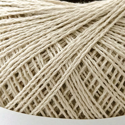 Pierrot brand 100% linen yarn in various colors, displayed in round spools with Japanese text indicating the material and origin.