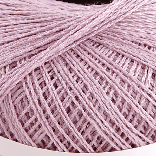 Pierrot brand 100% linen yarn in various colors, displayed in round spools with Japanese text indicating the material and origin in mauve pink