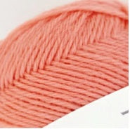 Close-up of Pierrot 100% Pure Wool showing the natural fiber texture and consistent ply, ideal for warm, structured garments in apricot colour