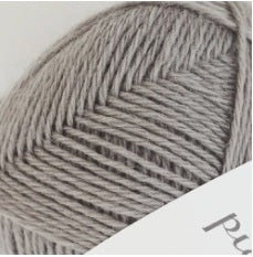 A 40g skein of Pierrot Pure Wool, 100% wool yarn made in Japan, featuring a smooth, balanced twist for knitting and crochet in clay colour