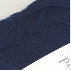 Elevate your knitwear. Discover the superior bounce and memory of this 100% Japanese wool. The premier choice for high-end boutique scarves and "toasty" decor in dark navy colour