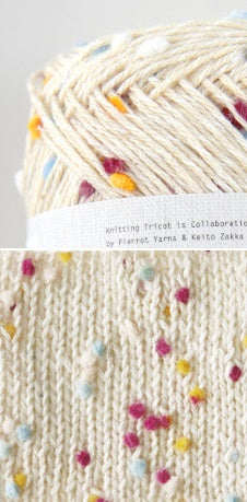 Pierrot Framboise yarn in Carnival with multicolored speckles, arranged on a surface with labels indicating the brand and type.
Japanese yarn in Singapore
lightweight summer shawl yarn,