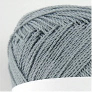 A compact ball of New Shine Cotton by Pierrot, highlighting the way light reflects off the polished cotton strands, characteristic of high-quality Japanese yarn in Blue Grey colour.