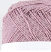 A 30g ball of Pierrot New Shine Cotton yarn made in Japan, showing the lustrous finish and smooth, tightly twisted 100% cotton fibers in Mauve Pink colour