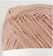 A 30g ball of Pierrot New Shine Cotton yarn made in Japan, showing the lustrous finish and smooth, tightly twisted 100% cotton fibers in peach pink colour