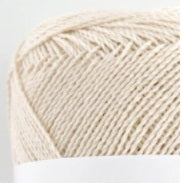 A compact ball of New Shine Cotton by Pierrot, highlighting the way light reflects off the polished cotton strands, characteristic of high-quality Japanese yarn in Ivory Colour