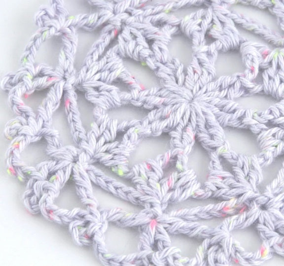 A crochet flower motif using Pierrot Pisca Made in Japan 40g 100% premium cotton yarn
