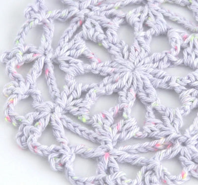 A crochet flower motif using Pierrot Pisca Made in Japan 40g 100% premium cotton yarn