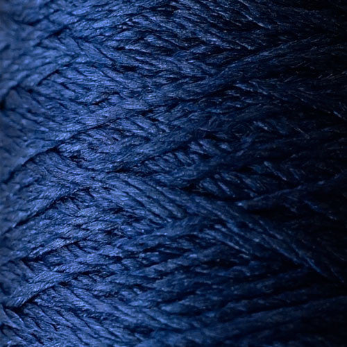A 100% pure silk fingering weight yarn from Pierrot, made in Japan, featuring a smooth, high-luster finish and a delicate ply for lightweight knitting and crochet in navy blue