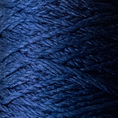 A 100% pure silk fingering weight yarn from Pierrot, made in Japan, featuring a smooth, high-luster finish and a delicate ply for lightweight knitting and crochet in navy blue