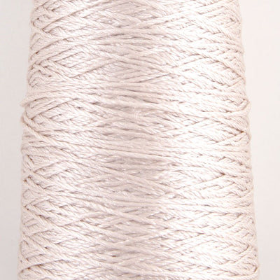 A 100% pure silk fingering weight yarn from Pierrot, made in Japan, featuring a smooth, high-luster finish and a delicate ply for lightweight knitting and crochet. in shell pink