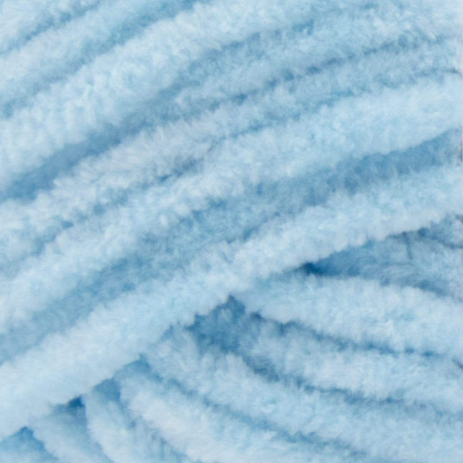Soft Premier Parfait Chunky yarn in a large skein, showing the thick, velvety chenille texture in light blue color