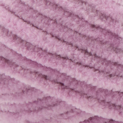 Soft Premier Parfait Chunky yarn in a large skein, showing the thick, velvety chenille texture in dusty purple colour